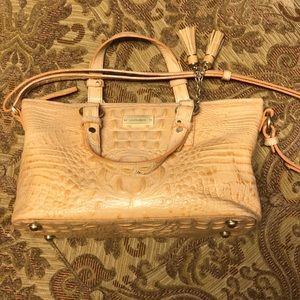 Brahmin handbag with adjustable shoulder strap.